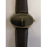 A Roy King manual wind wristwatch with silver case and buckle, 42mm bezel. SIA.