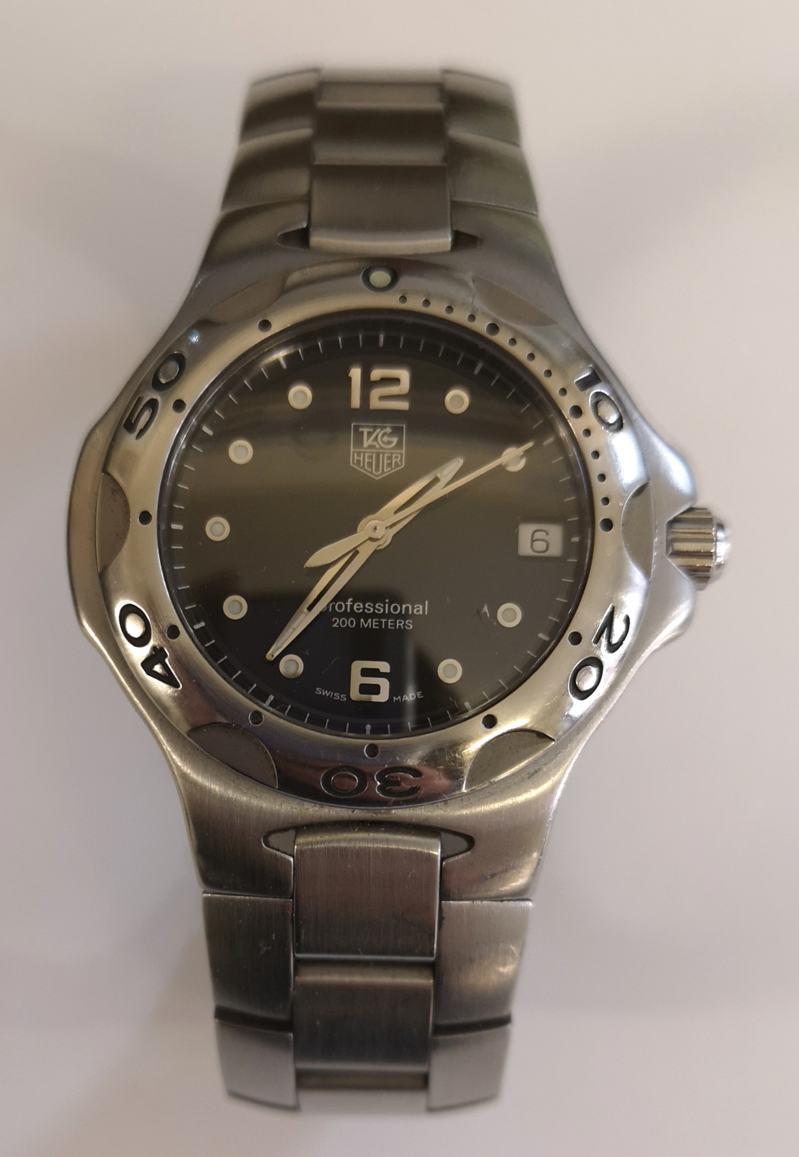 A Tag Heuer Professional stainless steel wristwatch on original bracelet having black dial with