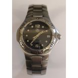 A Tag Heuer Professional stainless steel wristwatch on original bracelet having black dial with