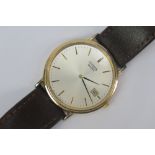 A Citizen wristwatch having silver dial, yellow metal batons and date aperture,