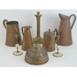 A quantity of copper including pouring jugs, single gilded candlestick,