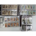 A large collection of cigarette cards contained within four albums including;