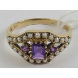 An Edwardian style 9ct gold amethyst and seed pearl ring,