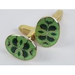 A pair of 9ct gold and green enamel cufflinks,