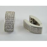 A pair of 18ct white gold Casa Gi earrings having pave set diamonds to front, approx 1.