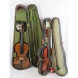 Two vintage violins in a/f condition, each with bow and within cases.