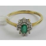 A 9ct gold emerald and diamond ring,