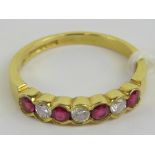 An 18ct gold ruby and diamond ring,