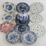 A Spode Italian design vase together with a set of four blue and white English ironstone plates,