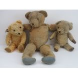 A collection of three vintage mohair Teddy bears, each with jointed limbs measuring 72cm,