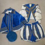 A vintage amateur dramatic doublet and hose costume with cape and felt hat.