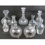 A quantity of assorted decanters and carafes, nine items.