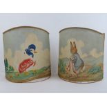 A rare pair of Beatrix Potter wall light shades in acetate,