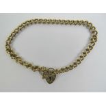 A 9ct gold charm bracelet having heart padlock clasp, stamped 375, 9.5g.
