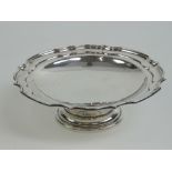 A HM silver tazza having pie crust edge and raised over single foot, 20.