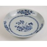 A single 18th century blue and white Oriental stoneware supper dish, 23cm dia.