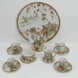A hand painted Japanese coffee service comprising four coffee cans and saucers, sugar bowl, jug,