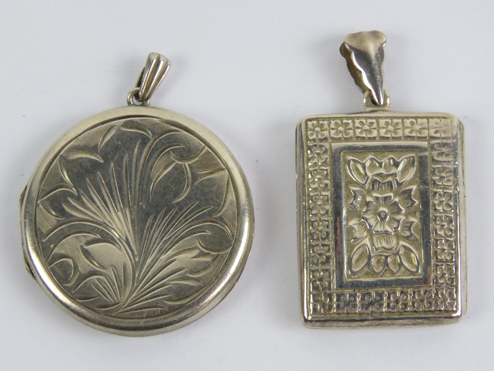 A HM silver locket or rectangular form having floral engraving to front and back, hallmarked 925,