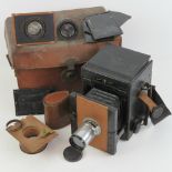 A Special Ruby vintage camera with associated lenses and slides including an Adon patent J H