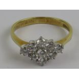 An 18ct gold and diamond ring,