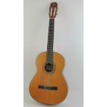 A contemporary Admira concerto classical guitar complete with leatherette case.