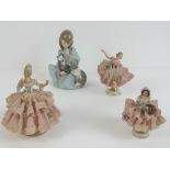 A Lladro figurine of girl in nightie with cat and puppy, 5604 impressed to base.