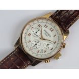 A Sekonda Classique having white ground dial with subsidiary hour, minute and seconds dials,