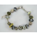 A 'Pandora' style charm bracelet,