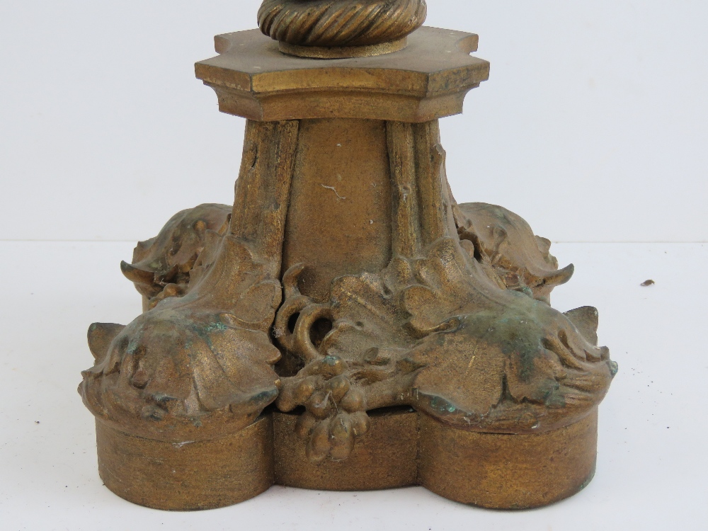 A heavy cast gilt bronze single candlestick with grape and vine decoration throughout, 56cm high. - Image 2 of 3