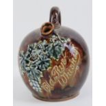 A Doulton Lambeth advertising 'Old Rye Whiskey' jug having vine and grape pattern on brown ground,