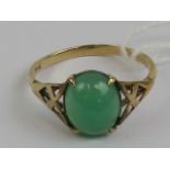 A vintage 9ct gold ring having green onyx cabachon and pierced shoulders, stamped 9ct, size N-O, 1.