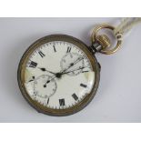 A c1920s open face top winding chronograph pocket watch with gun metal case,