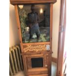 A contemporary recreation of a vintage arcade type curio machine 'The Graveyard', coin operated,