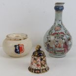 A Royal Crown Derby Imari hand bell, together with a cream ground marmalade jar with shield upon,