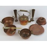 A set of three graduated copper colanders, together with a copper and brass teapot, a bed warmer,
