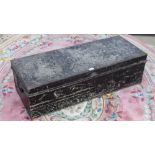 A vintage 19th century lidded tin travel trunk with end handles, 106cm wide.