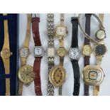 A quantity of assorted gents and ladies wristwatches including a Titus wristwatch in original case,