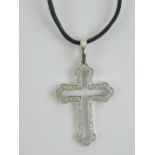 An 18ct white gold cross set with diamonds, approx 0.7ct total diamond weight, 5.
