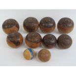 A quantity of vintage lignum vitae boules complete with jaques.