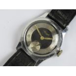 A c1930s German Kionzle two tone Bauhaus watch in Art Deco style having champagne and black dial,