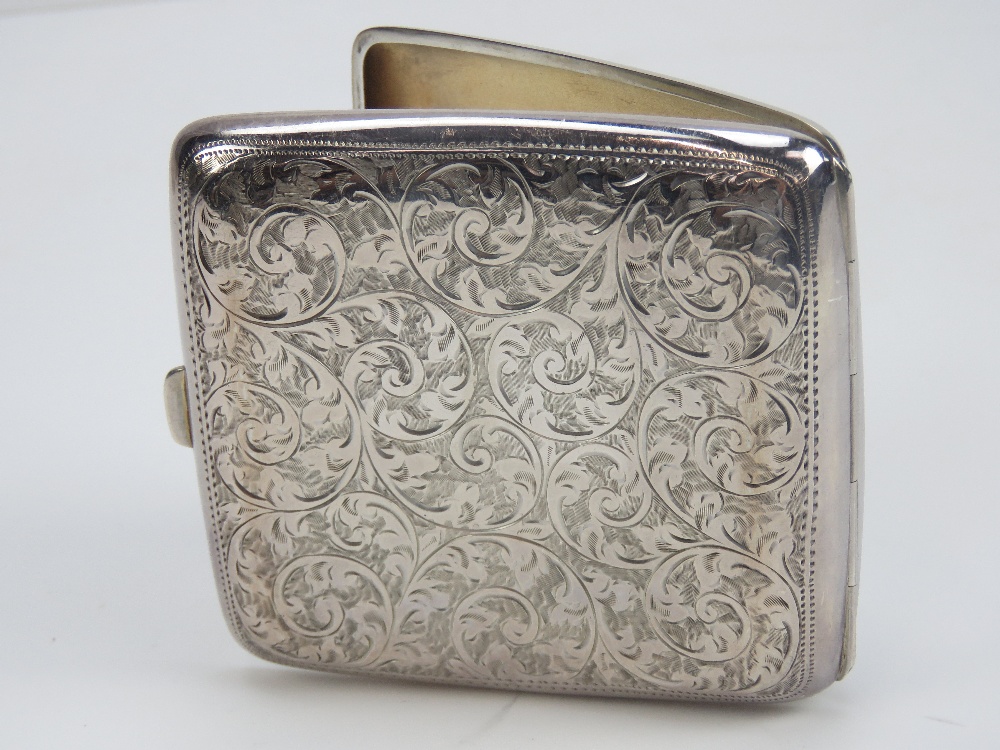 A HM silver cigarette case having gilt interior and elasticated straps, hallmarked Birmingham 1906, - Image 3 of 3