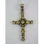 A silver cross pendant set with oval faceted citrines, stamped 925, 6.5cm in length.