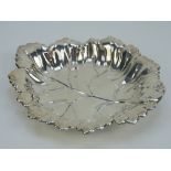 A HM silver pin tray in the form of a leaf measuring 14.5 x 12.