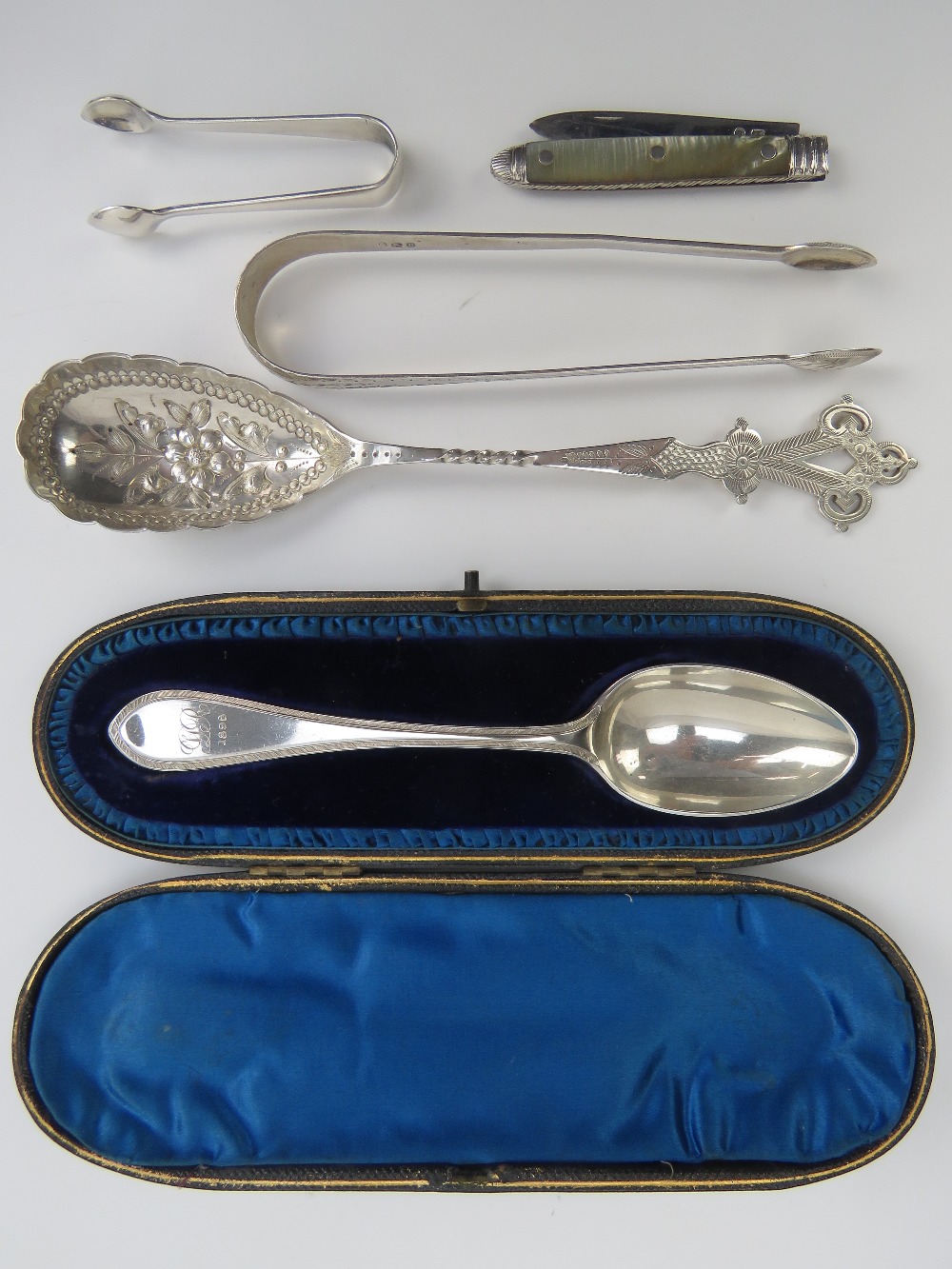 A HM silver spoon in fitted leatherette case, Sheffield 1898.