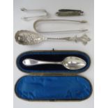 A HM silver spoon in fitted leatherette case, Sheffield 1898.