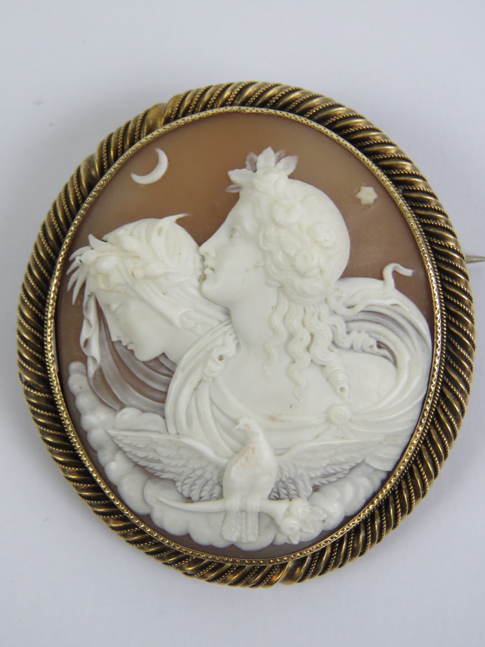 A superb large mid-Victorian shell cameo having finely carved depiction of Eos and Selene (Greek