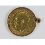 A 22ct gold George V 1912 half sovereign, 4g, in 9ct gold pendant mount. Total weight 5g.