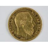 A Belgian .900 (21.6ct) gold Leopold II 1867 20 Francs coin, 6.5g.