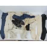 Three pair of kid leather gloves together with a quantity of vintage cotton stockings,