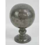 A Chinese pewter tobacco jar in the form of a globe, marked Kimsoon to lid, standing 16.5cm high.